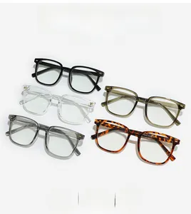 Macro detail of lightweight square glasses frames in five colors with dual rivet accents