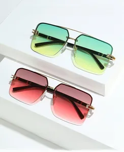 Detail of square gradient sunglasses with gold metal frame and rhinestone temples