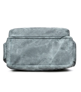 Detailed base view of grey-blue canvas tote bag featuring reinforced stitching and thick base