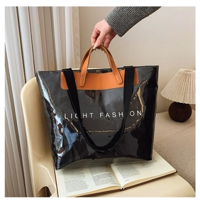 Sac cabas en papier Dupont noir avec poignées orange et lettrage Light Fashion