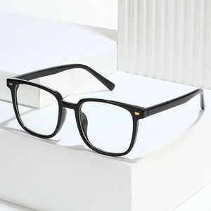Classic black square PC eyeglass frames with gold accents on white geometric steps