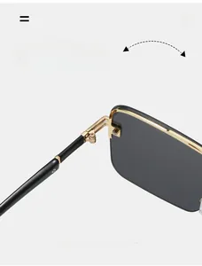 Detail of durable gold-finished metal hinge on vintage semi-rimless square sunglasses