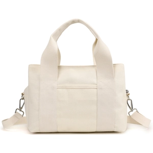 Cream canvas tote bag with adjustable shoulder strap and front pocket on white background