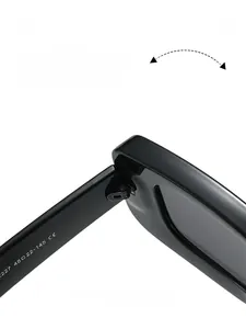 Macro shot of durable metal hinges and silver size specs on black square sunglasses