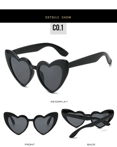 Detailed views of heart-shaped black sunglasses featuring front, back and 45-degree angles