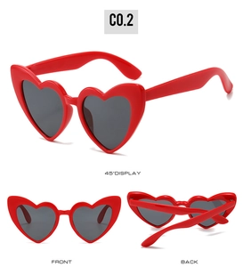 Detail view of red heart-shaped sunglasses with dark lenses from front, back and 45-degree angle