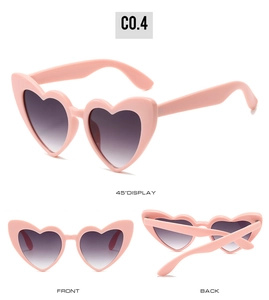 Three-way view of pink heart-shaped sunglasses with grey gradient lenses on white background