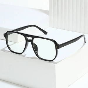 Retro pilot double bridge eyeglasses in glossy black with wide temples and gold rivet detail
