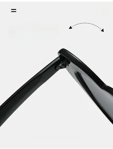 Detail of durable texture hinge on black heart sunglasses showing fold resistance
