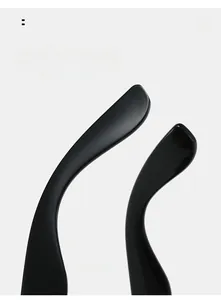 Detail of ergonomic curved mirror legs on sleek black heart-shaped sunglasses