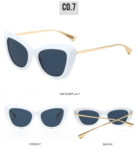 Dettagli degli occhiali da sole cat-eye bianchi con stanghette dorate e lenti scure