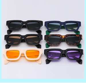 Detailed flat lay of rectangular sunglasses in diverse frame colors and tinted lenses