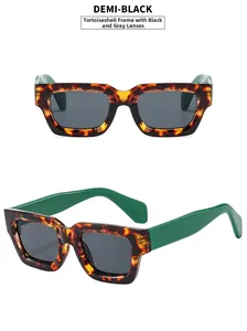 Detail view of square tortoise frame sunglasses with vibrant green temples and grey lenses