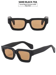 Detail view of square sand black thick frames and tea lenses on vintage sunglasses