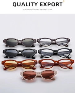 Detailed view of various colors of vintage oval cat-eye sunglasses with metal dot accents