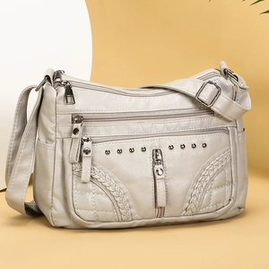 Minimalist soft PU leather crossbody bag with multi-layer zipper pockets in beige