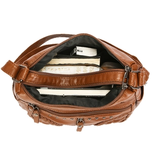 Classic caramel brown faux leather crossbody bag with multiple zippers and large capacity