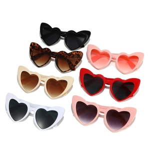 Fashionable heart-shaped sunglasses collection in multiple colors on a white background