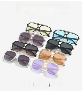 Multiple colors of pilot sunglasses with metal accents shown on a white background