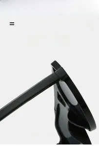 Detailed close-up of durable hinge structure and glossy black frame on pilot sunglasses