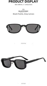 Detail of square black sunglasses featuring silver metal bridge and dark gray lenses