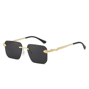 Lunettes de soleil carrées sans monture avec branches serpent dorées et verres gris