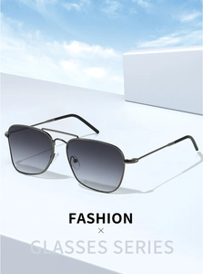 Detail of square aviator sunglasses with gunmetal stainless steel frame and gradient lenses