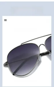 Detail view showing thin gunmetal stainless steel frame and elastic aviator bridge