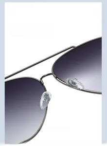 Detail of soft silicone nose pads on gunmetal aviator sunglasses for pressure relief