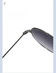 Macro detail of durable textured hinge and gunmetal frame on aviator sunglasses