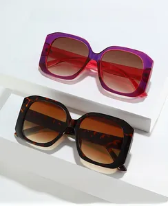 Detail view of square gradient purple and tortoiseshell fashion sunglasses with brown lenses