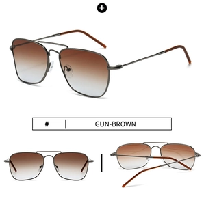 Detail view of gunmetal aviator sunglasses with brown gradient lenses and dual bridge frame
