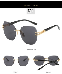 Detailed views of rimless octagonal sunglasses with gold metal temples and grey lenses