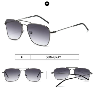 Detail view of gun-gray aviator sunglasses with stainless steel frame and gradient lenses