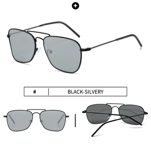 Detail view of square aviator sunglasses with black stainless steel frame and silver lenses