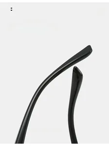 Detail of curved black glossy mirror legs for minimalist rimless sunglasses