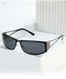 Macro detail of gunmetal sunglasses frame with geometric hollow temples and precision screws