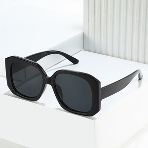 Classic oversized square black sunglasses with thick frames and premium dark lenses