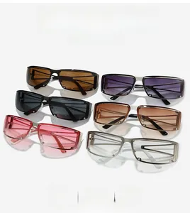 Flat lay view of six colorful rimless rectangular sunglasses with metal accents
