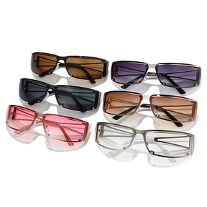 Fashion rimless oversized square sunglasses set with metal studs and Y2K aesthetic design