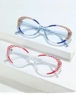 Detail of stylish two-tone cat-eye TR90 frames showing blue and orange geometric patterns