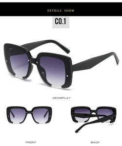 Détail de lunettes de soleil carrées sans monture avec cadre noir et verres dégradés violets