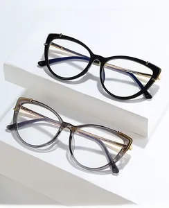 Lunettes anti-lumière bleue œil de chat en noir et gris transparent sur blocs
