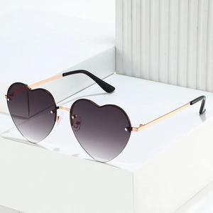 Lunettes de soleil cœur sans monture avec verres gris dégradés et branches en métal doré