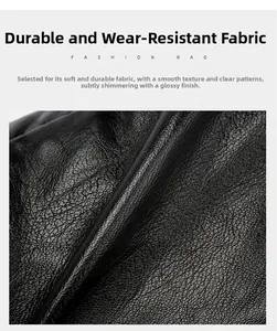 Macro detail of soft black litchi grain leather texture with wear-resistant finish