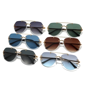 Frameless aviator sunglasses set with gradient lenses and gold metal bridge in six colors