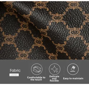 Close-up of brown monogram pattern on synthetic leather with refined pebble texture