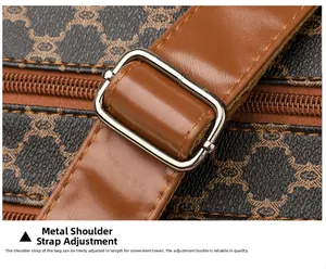 Detail of adjustable silver buckle and durable brown leather strap on patterned shoulder bag