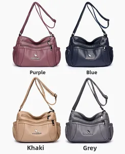 Detail view of multi-pocket crossbody bags in purple, blue, khaki and grey litchi texture