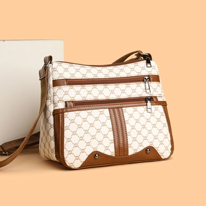 Vintage patterned large crossbody bag with multiple zip pockets and adjustable strap